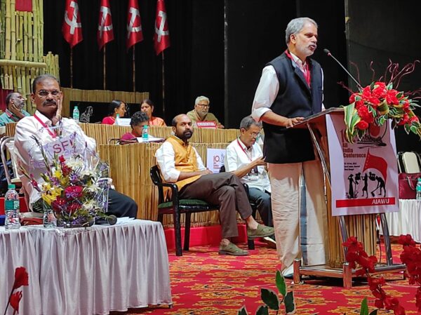 A. Vijayaraghavan (standing) and B. Venkat (Sitting, extreme left) at the 10th All India Conference of AIAWU